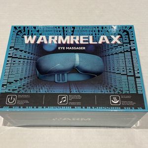 Warm relax heated Eye Massager/music/relieve fatigue new with travel bag. No box